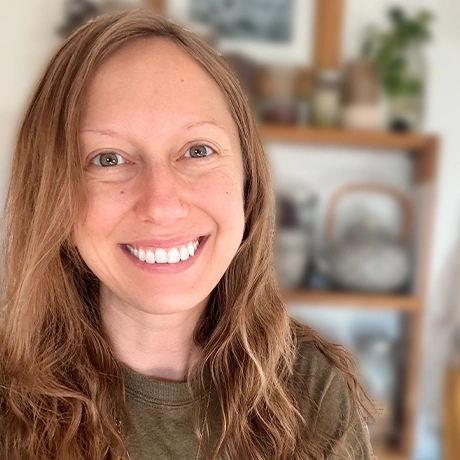 Headshot of Kate Osterloh smiling at the camera.
