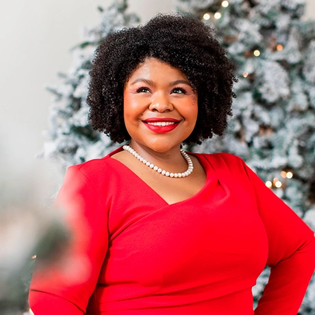 Headshot of Felicia Williams smiling at the camera.
